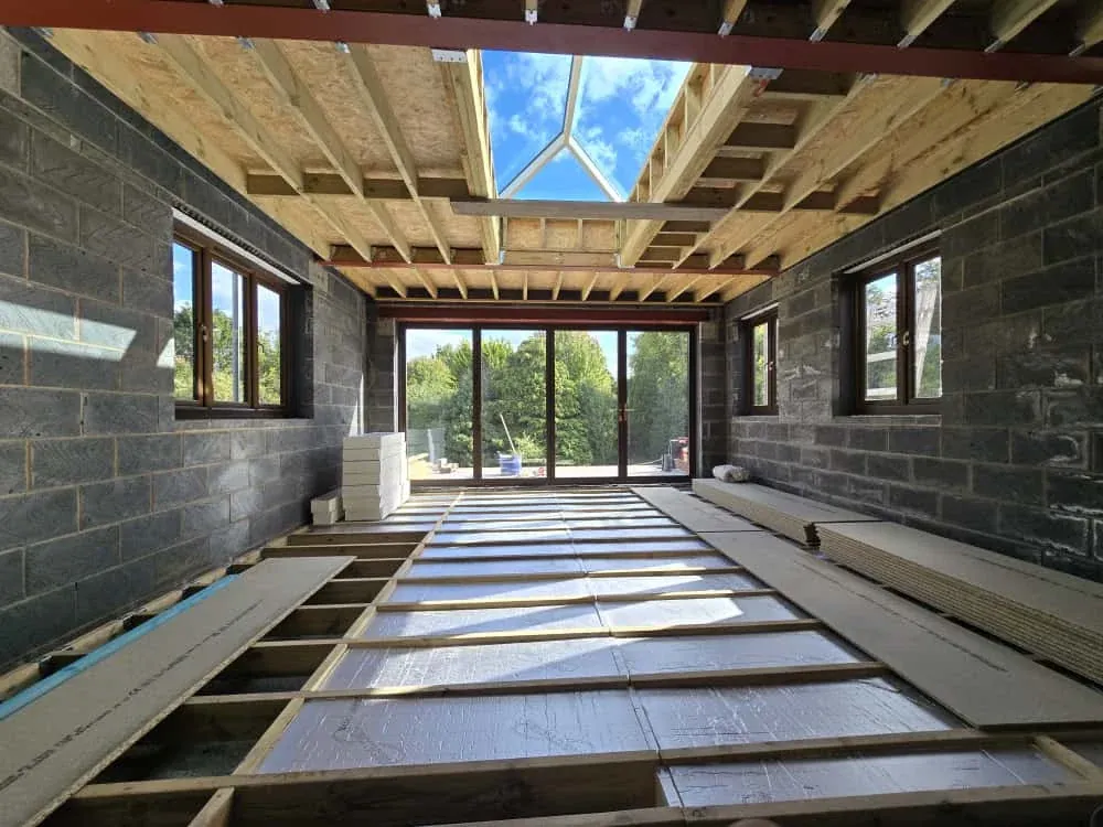 Floor joists, a roof lantern and a bifold opening Floor joists, a roof lantern and a bifold opening