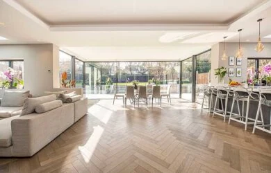 Open-plan living and kitchen with a herringbone floor
